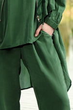 CURATE A SHOW OF PANTS-GREEN PASTURES
