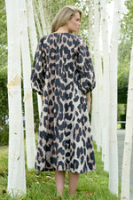 TRELISE COOPER SLEEVE IT AT THAT DRESS