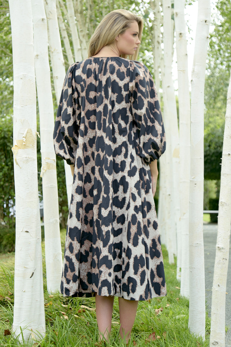 TRELISE COOPER SLEEVE IT AT THAT DRESS